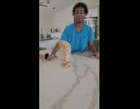 Man pulled the Jenga blocks on the bottom side