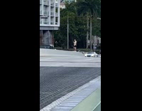 Man beige jacket dance bicycle middle road Part 1