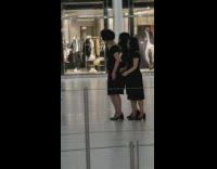 Guy do creepy movement inside mall for halloween 