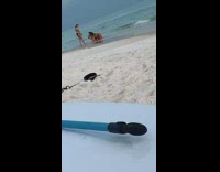 Two girls fierce crawl lay sand stick