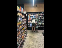 Man surprising brother at grocery store 