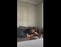 Collab BoysIG-Default - Woman lie down on the back of shirtless man on the couch