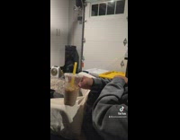 Guy finishes milk tea then tells his friend he has a lot