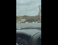 Guy on traffic enforcer dance at street in NYC 