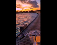Sunset view at the beach resort walkway