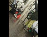 Guy takes white shirt off gives lady