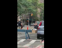 Girl lays in wood box guy guitar 