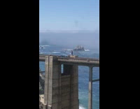 Man dance bridge edge video shoot risky