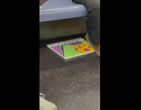 Surprised pikachu meme painting on subway floor 