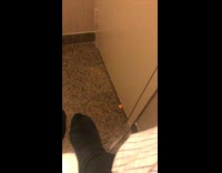 Guy checks on girl in restroom cheez it under door