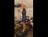 Grey robe girl balloon between legs fail 