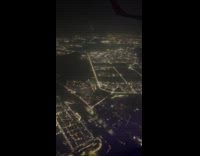 Above the City lights view from airplane