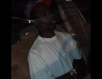 Collab WeirdM - Man Knocks on Car Hood to Wake Man in white shirt