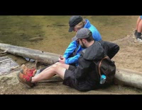 Collab IITW - Couple same brown shoes lake chipmunk log