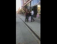 Girls group selfie outside restaurant ripped jeans