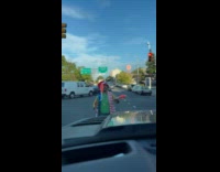 Collab WINY - Clown juggle pins perform on street crosswalk