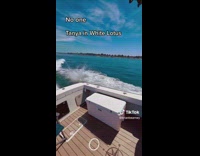 Guy jumps off boat like Tanya in White Lotus