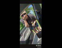 Girl picks up friend with urn in passenger seat 