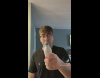 Guy tests temperature on forehead 