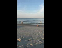 Couple hold hands romantic video shoot beach