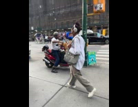 Collab WINY - Orange cat on red motorcycle with its owner