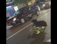 Yellow shirt guy rolls tumbles street book