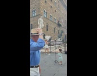 Kid daughter hold tripod mom pose with statues