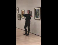 Girl blocks art for selfie 