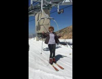 Woman falls while trying to dismount ski lift