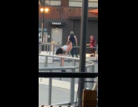 Collab IITW - Woman white sleeveless black skirt roller skates dances at skate park