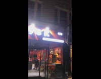 Raw chicken on ground outside restaurant