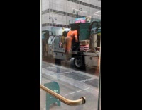 Orange construction uniform inflated by machine air