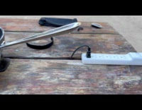 Tesla car electricity used to cook burger