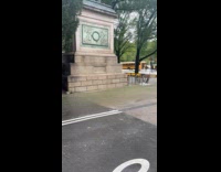 Flood water flows from the Prospect Park