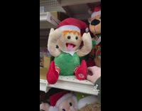 Elf toy wiggles tongue after girl presses foot 