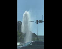 Fire hydrant broken large waterfalls on street