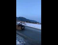 3 guys tow a couch on open road 