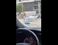 Collab IITW - Woman bikini on bed middle of street