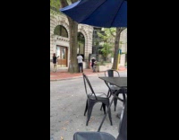 Collab IITW - Two men chase skit at the sidewalk