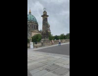 Shirtless guy sailor hat blue dome building