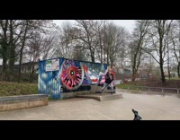 Boy jumps off dumpster on rollerblades fail 