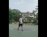 Guy makes half court basketball shot 