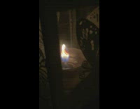 Fire in a small candle with in a weird form