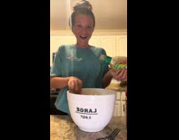 Collab ClipsIG - Woman pouring dressing on bowl