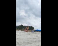 Collab IITW - Woman sits by the beach for photo