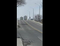 Collab IITW - Woman in blue top run while man stands on the bridge