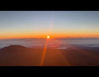 Sunrise sea of clouds Mauna Kea summit