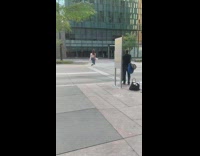 Girl tap dances black shoes street road 