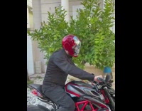 Guy wears electronic iron man helmet mask 