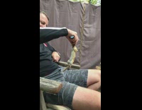 Guy lifts peanut chipmunk falls down backyard